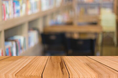 Selected focus empty brown wooden table and Coffee shop blur background with bokeh image. for your photomontage or product display.の写真素材