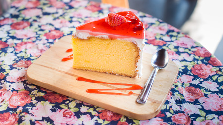 Strawberry Cake on wooden plate.の写真素材