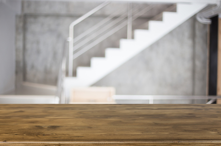 Selected focus empty brown wooden table and Coffee shop blur background with bokeh image. for your photomontage or product display.の写真素材