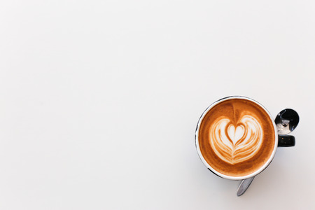 Hot art Latte Coffee in the table.の写真素材