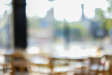 Blurred background : Coffee shop restaurant blur background with bokeh light.