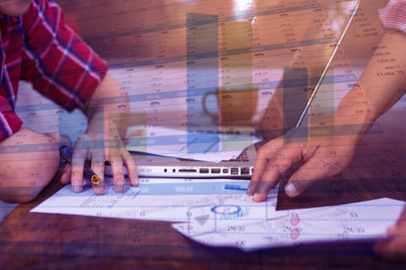 business documents on office table and graph business with social network diagram and man working in...