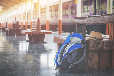 Traveler's bag at a train station.の写真素材