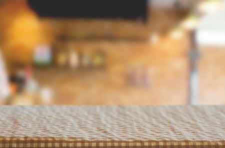 Checkered table cloth on empty table for Your photomontage or product display.の写真素材