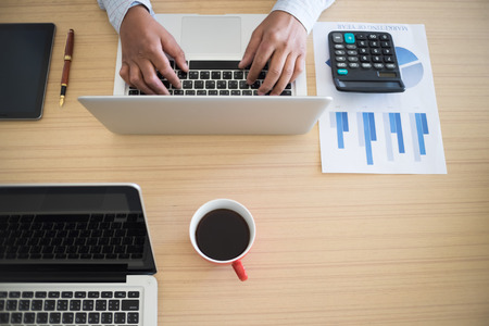 business man working on the laptop at office with copyspace.の写真素材