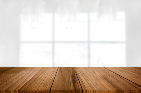 Empty wooden table and space white background, product montage display, window background.の写真素材