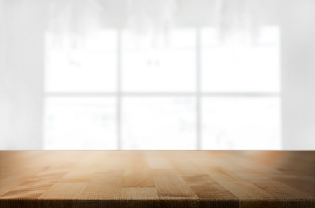 Empty wooden table and space white background, product montage display, window background.の写真素材