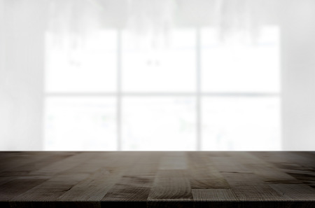 Empty wooden table and space white background, product montage display, window background.の写真素材