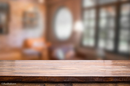 Selected focus empty brown wooden table and Coffee shop blur background with bokeh image, for...