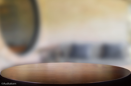 Selected focus empty brown wooden table and Coffee shop blur background with bokeh image, for product display montageの写真素材