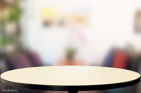 Selected focus empty brown wooden table and Coffee shop blur background with bokeh image, for product display montageの写真素材
