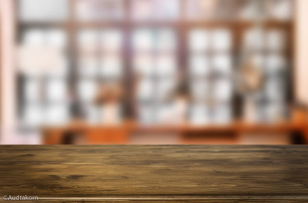 Selected focus empty brown wooden table and Coffee shop blur background with bokeh image, for...