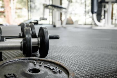 exercise weights - iron dumbbell with extra plates.の写真素材