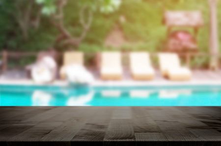 wood Table Top Background and Swimming Pool.の写真素材