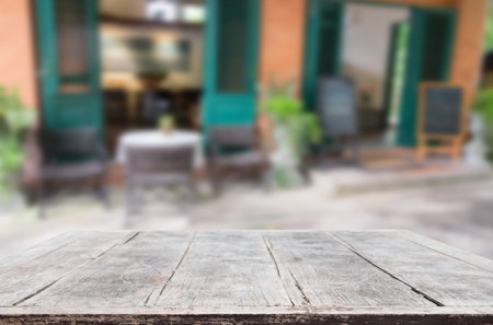 street cafe and wooden desk board place.