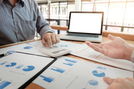 Administrator business man financial inspector and secretary making report, calculating or checking...