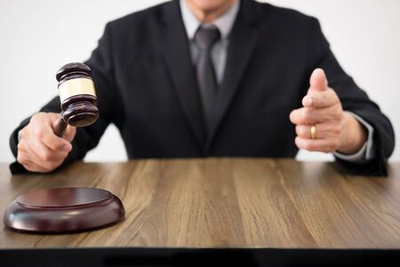 judge wags his finger as he lays down the law.の写真素材