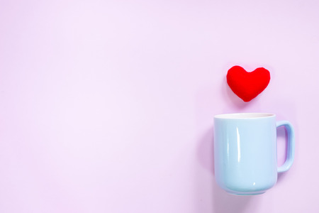 Top view of flat lay decoration Romantic, St valentine's day concept with pin hearts and cups or mug  on pink background and copy space の写真素材