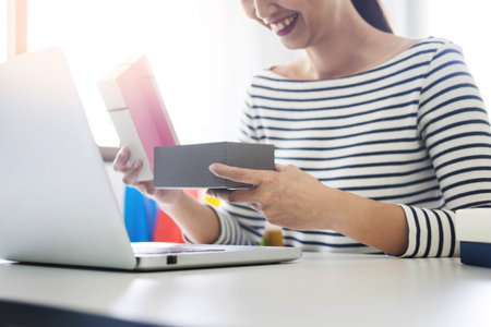 e-commerce delivery concept and online selling start up small business owner packing in the card box...