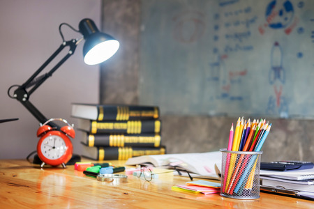 colorful equipment class with typical wooden benches Books and blackboard supplies.Back to school, Teacher's day holiday greeting icon. Education knowledge day conceptの写真素材
