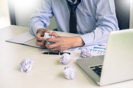 Depressed failure and tired businessman late sad and solving problem in office. in meeting room....