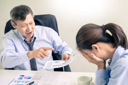working in the office. Manager is not satisfied the argument. Business complaining in discuss during their no reason about mad group of team After office conflict against madly manager.team leader dissatisfied with reportの写真素材