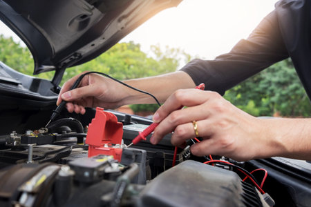 Maintenance car repair automotive concept, Man checking car mechanic working  under car hood in...