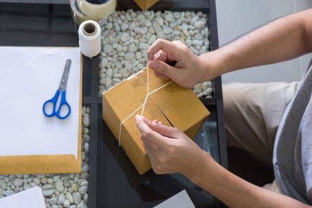 e-commerce shopping company concept, business entrepreneur seller prepares the delivery box for the...