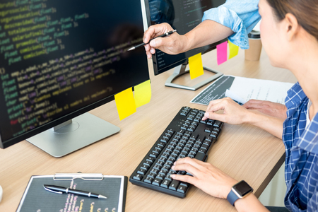 IT office Programmers software development coding technologies On Computer working in a company office.の写真素材