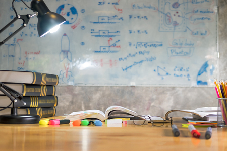 colorful equipment class with typical wooden benches Books and blackboard supplies.Back to school, Teacher's day holiday greeting icon. Education knowledge day conceptの写真素材