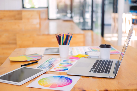 team interior designer drawing a new project using graphic computer and choosing Color swatch samples in modern Creative studioの写真素材