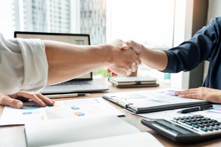 Business handshake after agreement meeting or negotiation finishing up dealing project, partnership approval and deal conceptの写真素材