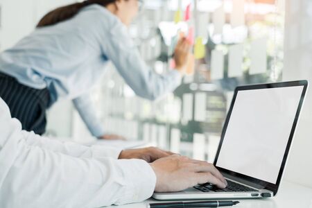 Business People Talking Discussing with coworker planning analyzing financial document data charts and graphs in Meeting and  successful teamwork Conceptの写真素材
