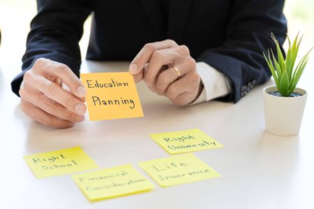 wealth management concept, business man and team analyzing financial statement for planning financial customer case in officeの写真素材