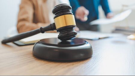 lawyer lawsuit notary consultation or discussing negotiation legal case with document contract women entrepreneurs in the office.の写真素材