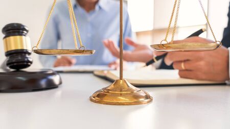 Legal counsel presents to the client negotiating a contract Serious consultations, Concepts of Law and Legal services.の写真素材