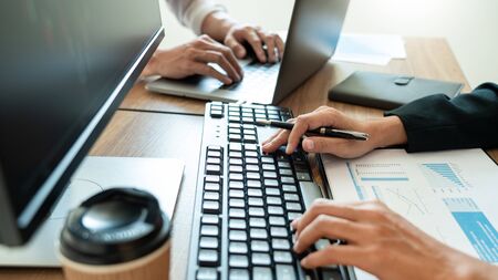 Business team investment Entrepreneur Trading discussing and analysis graph stock market in traders office. Business financial exchange concept.の写真素材