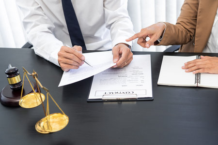 Lawyer or judge present client with contract document papers, Law and Legal services concept.