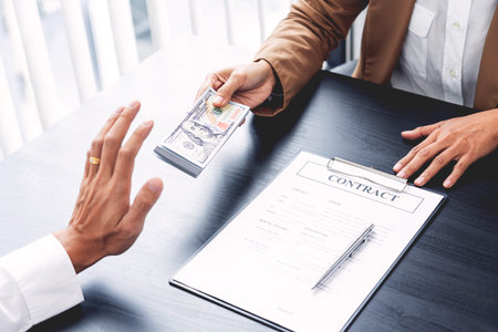 Businessman partner hand gesture rejecting refusing money, anticorruption concept