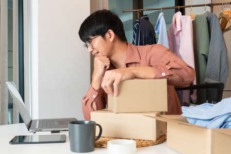 Online small business entrepreneur merchants working at store preparing products to deliver to customers, startup and online business conceptの写真素材