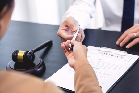 Lawyer or judge present client with contract document papers, Law and Legal services concept.