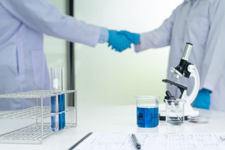 A scientist wearing medical isolation gown