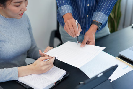 Office work concept a smart businessman offering an idea about the marketing strategies to his...