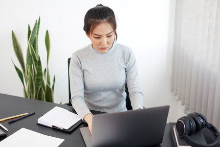 Office work concept a female secretary working on her duty about schedule arrangement and some...
