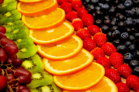 Fresh fruits concept, Arrangement in row of colorful fruits healthy as background.の写真素材