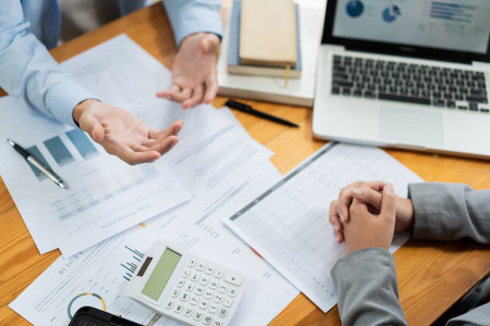 Business negotiation concept the male real estate broker negotiating his point to the female...