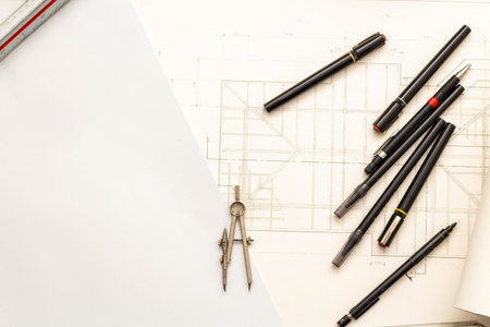 Mockup of architectural concept, Top view of drawing tools and engineer drawing on blueprint.の写真素材