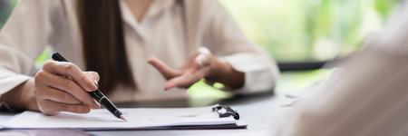 Coworker business concept, Businesswoman discussing about project of business together in office.の写真素材