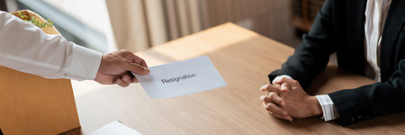Male employee with belongings cardboard box sending resignation letter to executive for leaving job.