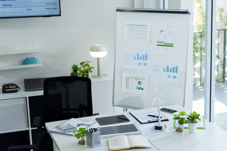 Modern professional office desk setup highlighting sustainability and environmental social...